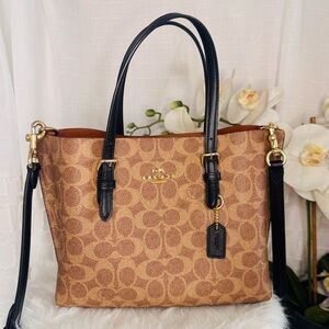 Coach Mollie Tote 25 in signature coated canvas and smooth leather- GUC